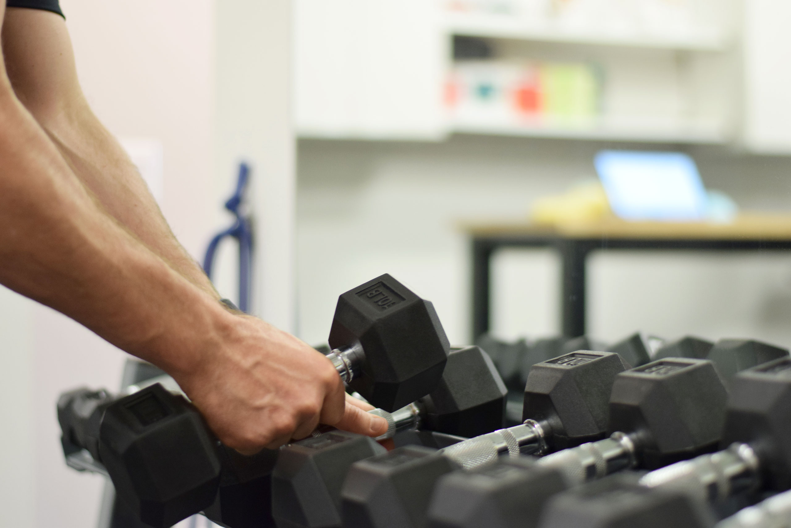 Pulling dumbbells of the rack